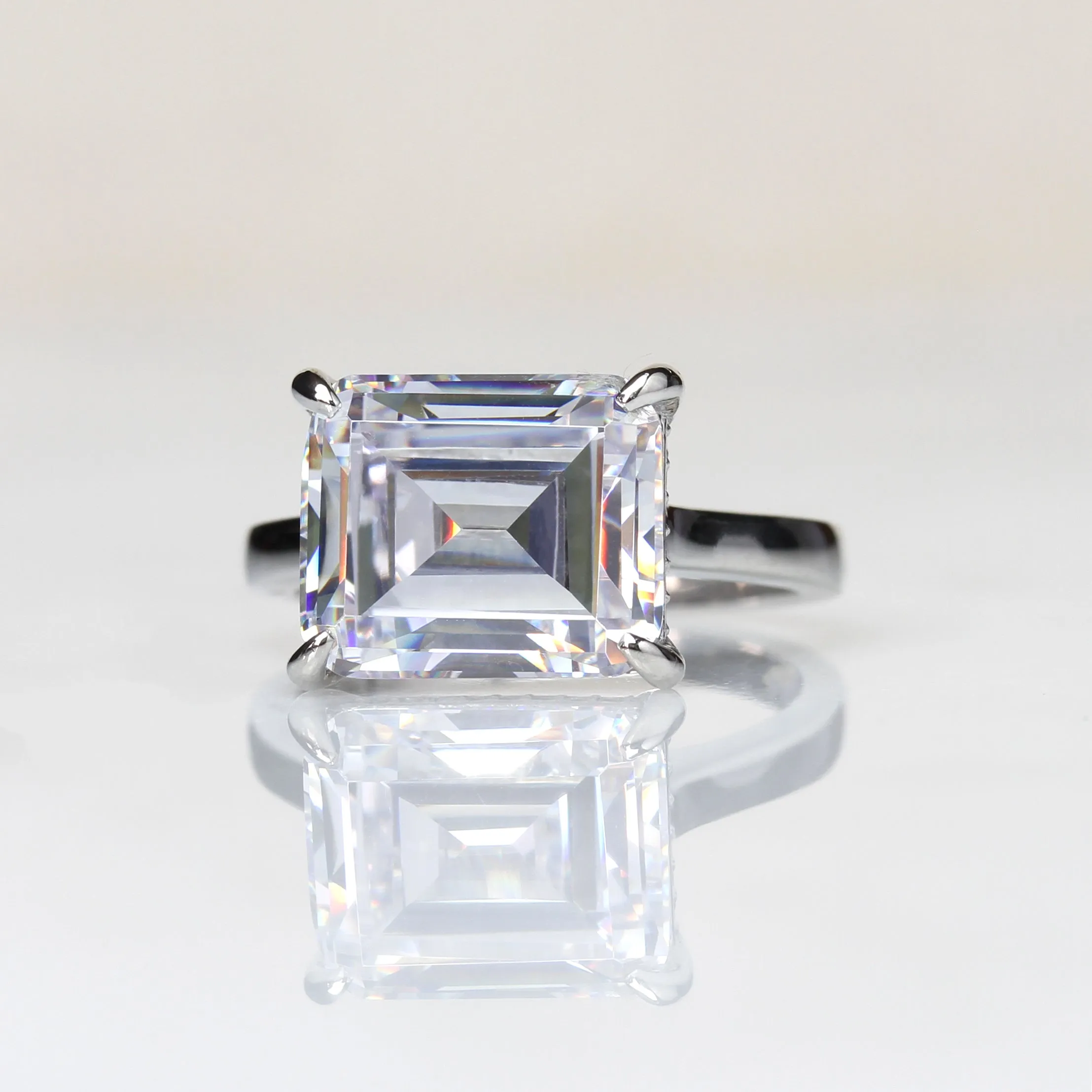 3.8 Carat, 7 Carat Hidden Halo Emerald Ring