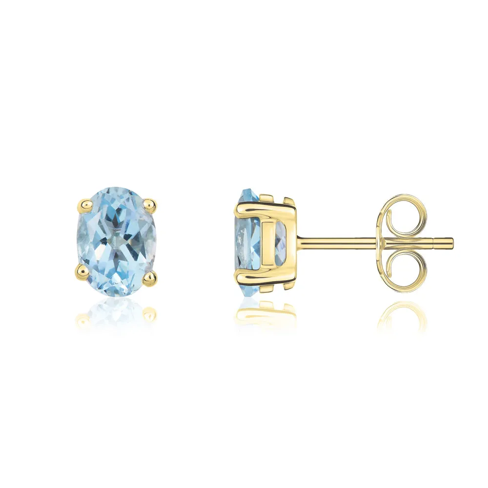 9ct Yellow Gold Aquamarine 7x5mm Oval Claw Set Stud Earrings