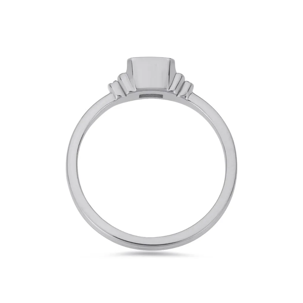 Deco emerald cut solitaire diamond ring in platinum