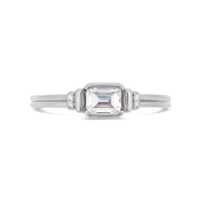 Deco emerald cut solitaire diamond ring in platinum