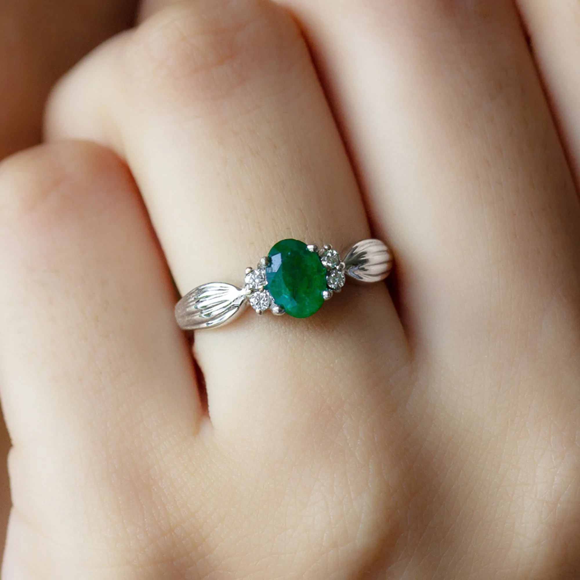 Oval Emerald Solitaire Engagement Ring with Diamond Accent