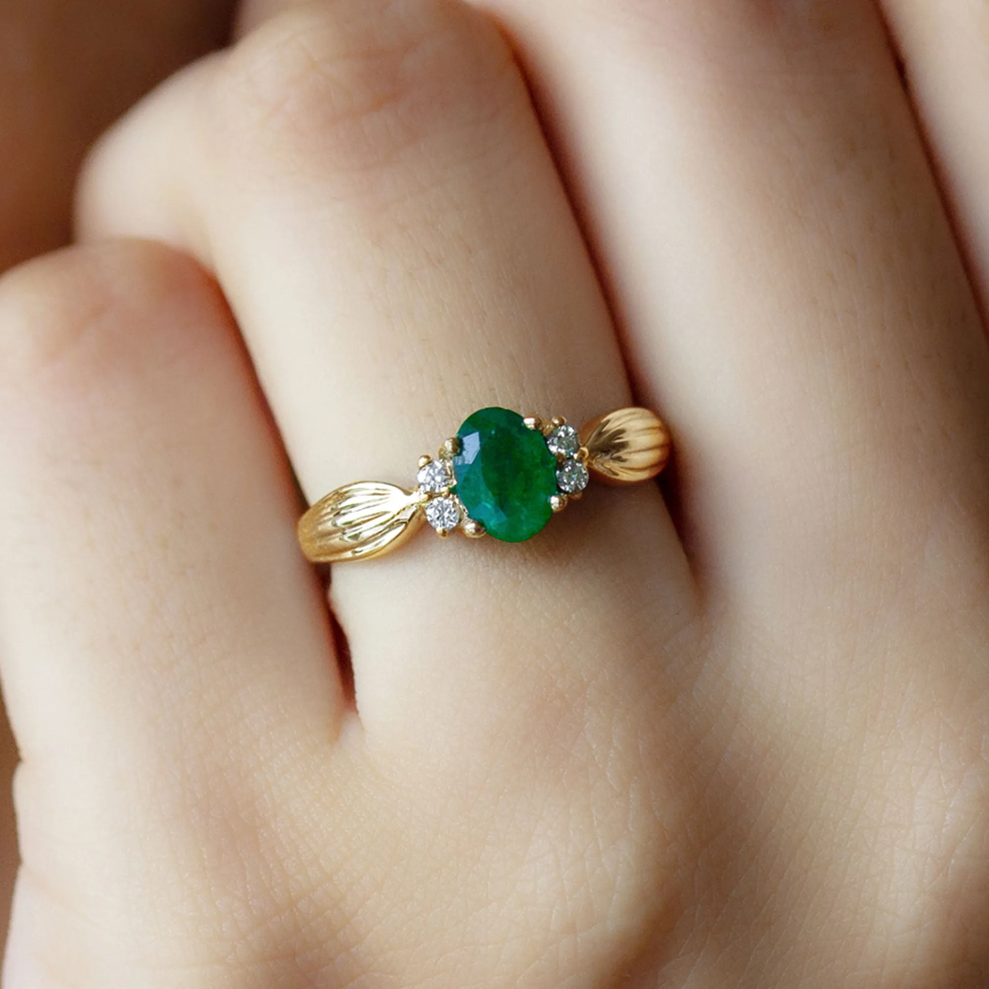 Oval Emerald Solitaire Engagement Ring with Diamond Accent